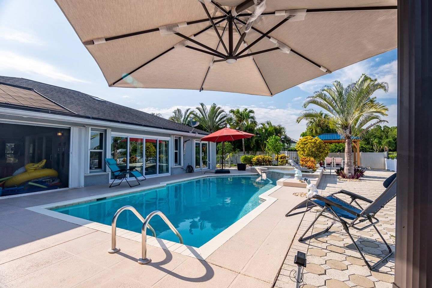 Pool and patio at the lakefront spa house