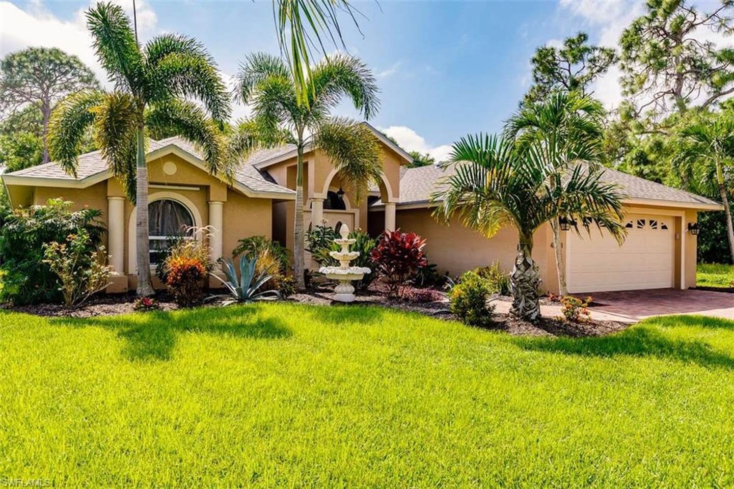 Front exterior of Tiki Paradise Retreat in Bonita Springs